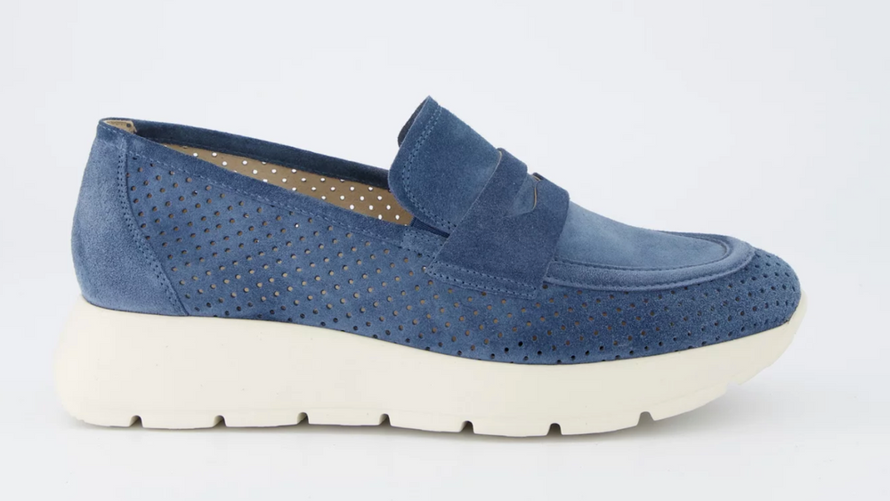 Blue loafer shoe on a white background